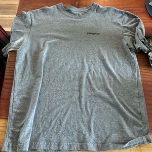Dark Gray colored Patagonia T-Shirt. Lightly worn.